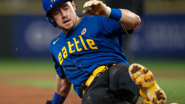 Sep 15, 2023; Seattle, Washington, USA; Seattle Mariners left fielder Jarred Kelenic (10) slides into third base against the Los Angeles Dodgers at T-Mobile Park. Mandatory Credit: Stephen Brashear-USA TODAY Sports  